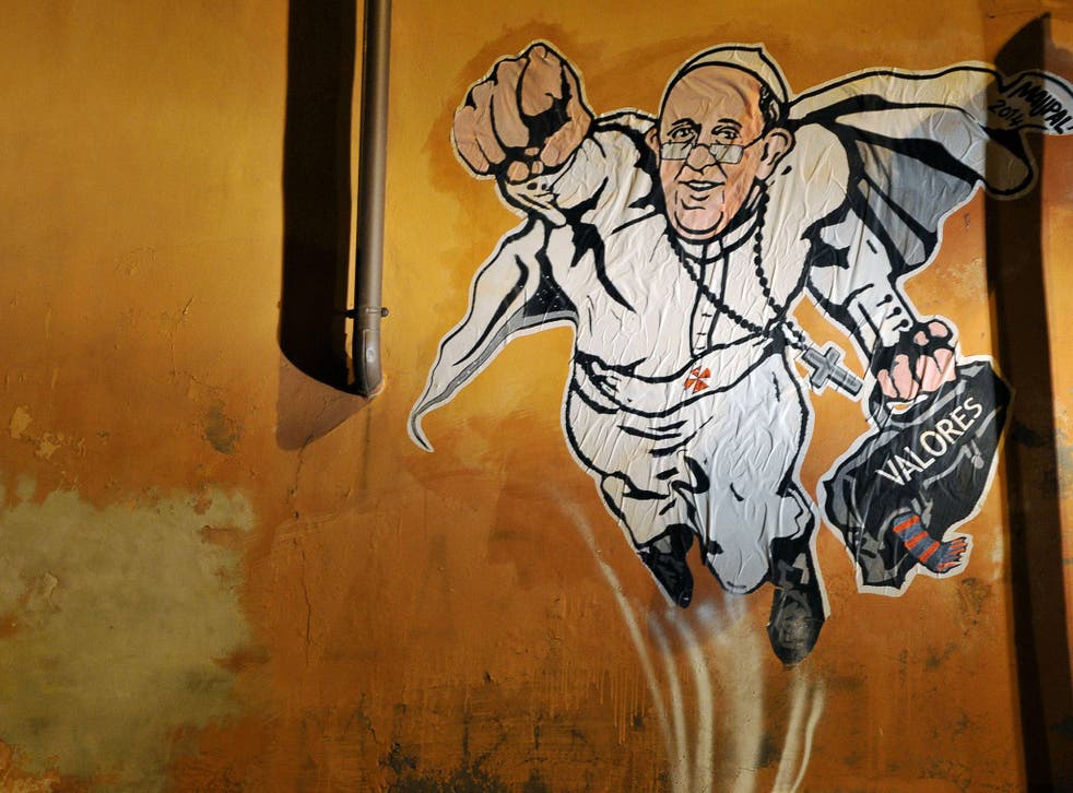 The SuperPope image was pasted to the wall by artist Maupal