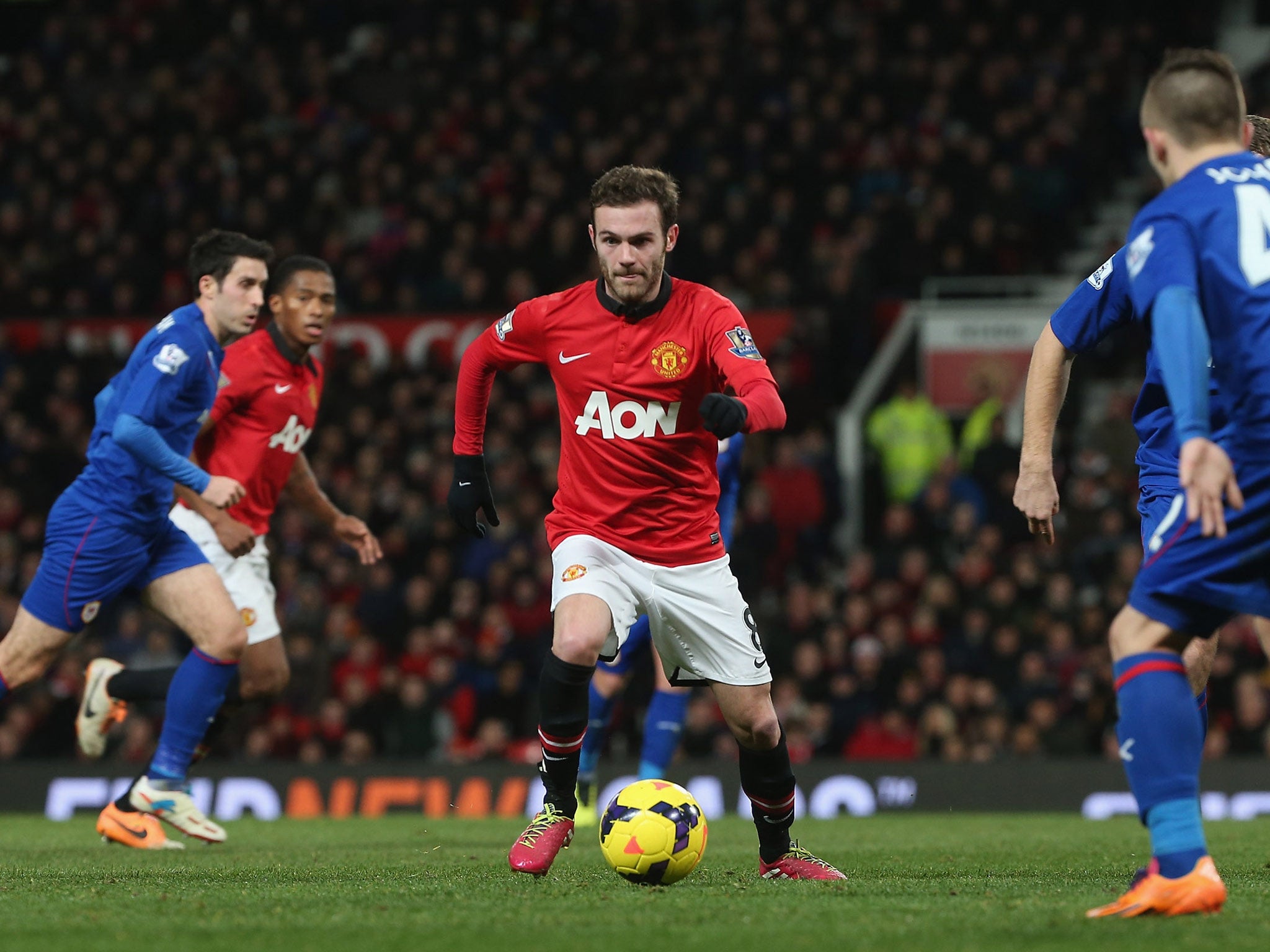 Juan Mata in action on his debut for Manchester United against Cardiff