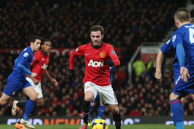 Juan Mata in action on his debut for Manchester United against Cardiff