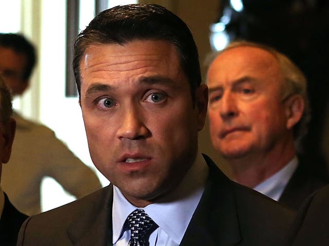 Representative Michael Grimm has defended his actions after he told a US cable TV reporter that he would "break" him in an interview after the State of Union address