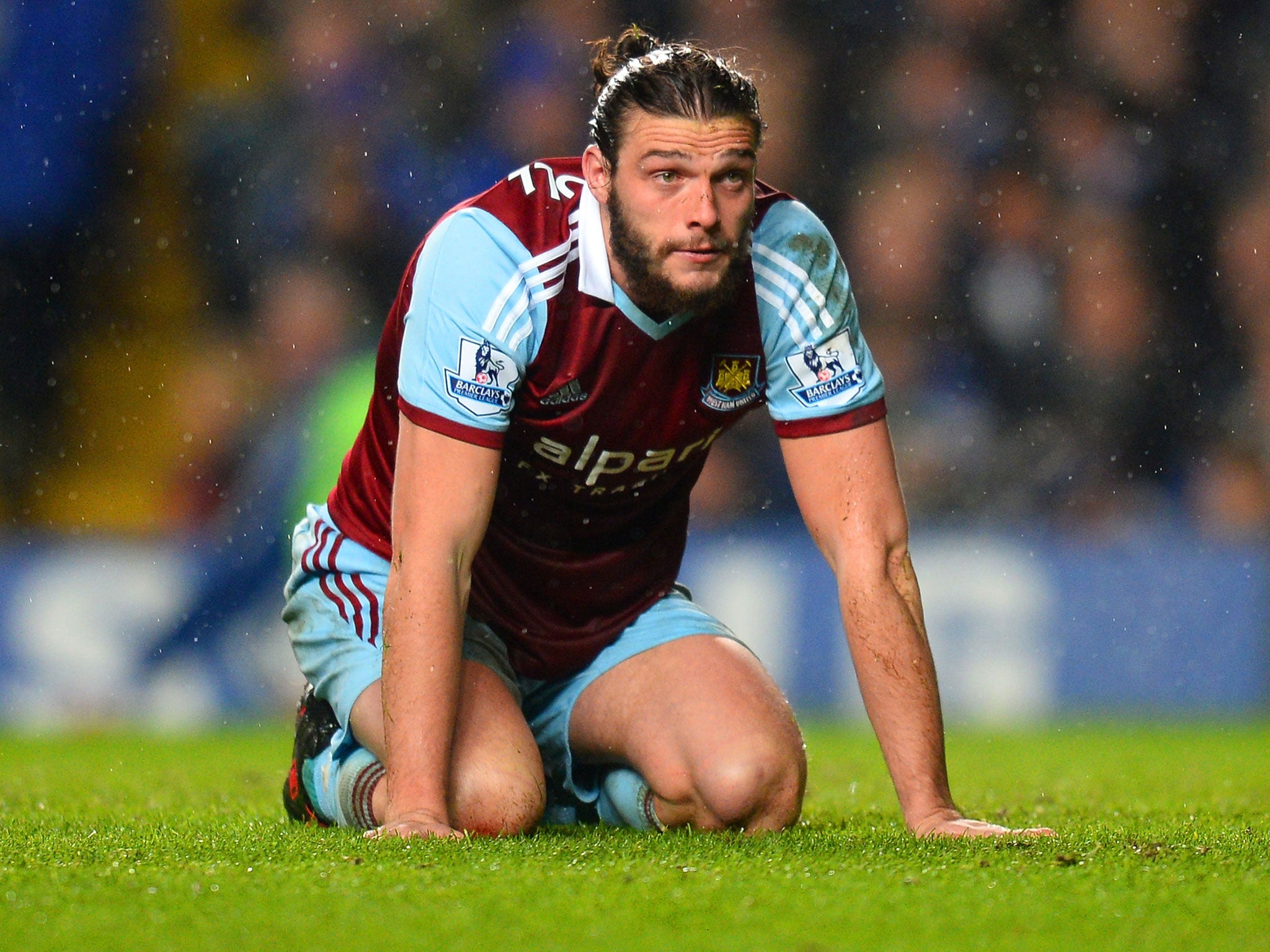 Injured West Ham striker Andy Carroll is expected to be out until October