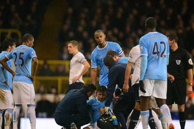 Sergio Aguero receives treatment on a hamstring injury during Manchester City's 5-1 win over Tottenham