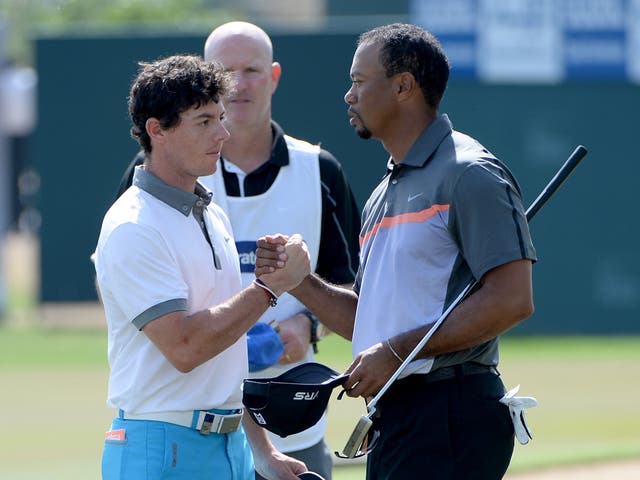 Rory McIlroy with Tiger Woods in Dubai