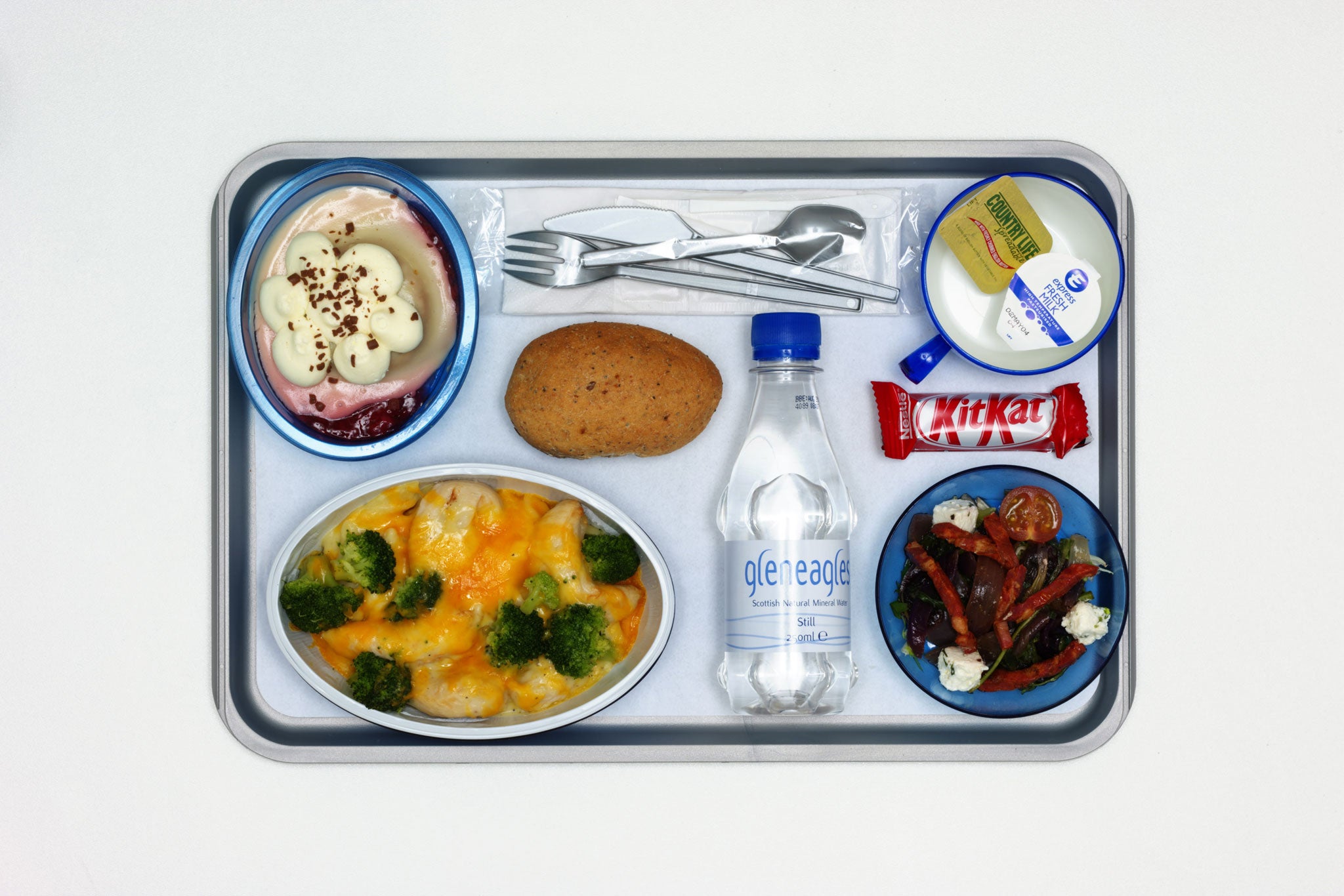 The free drinks and snacks recall the golden years of 20th-century aviation, when flying retained a dash of glamour