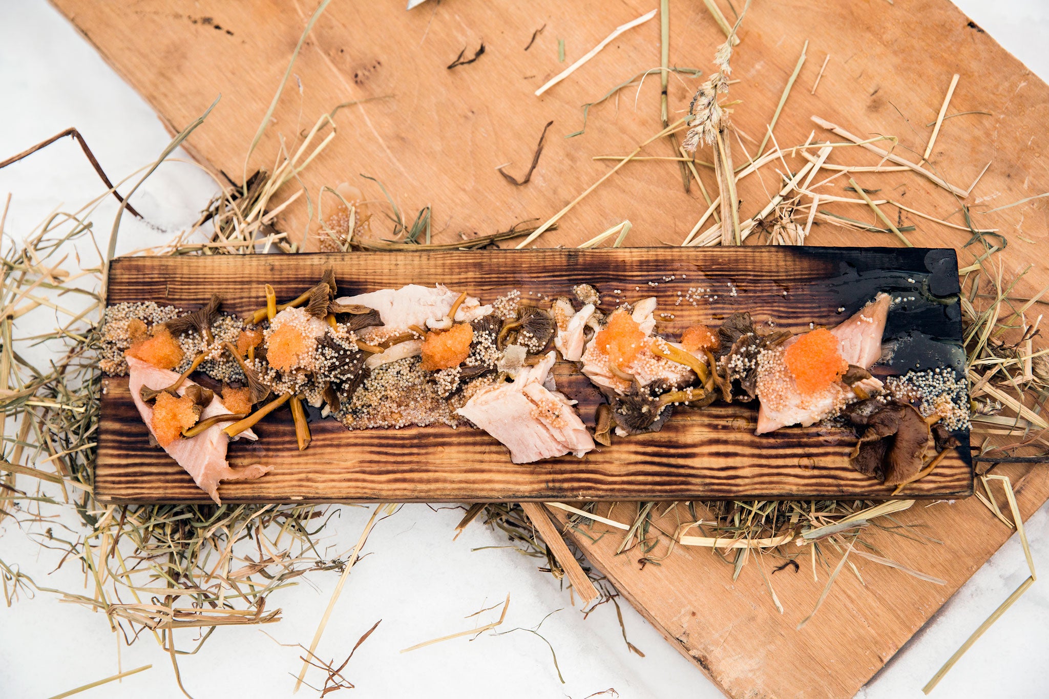 Ekstedt prepared trout, roe and pickled mushrooms