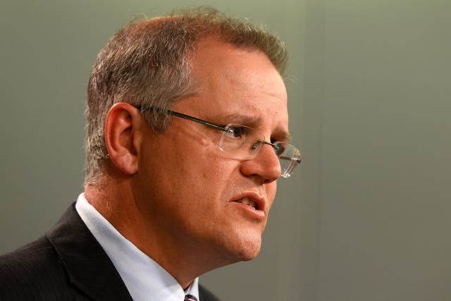 Australian Immigration Minister Scott Morrison speaks during a press conference in Sydney. A document leaked byrefugee advocates appears to show the draft of a code of conduct written by the Minister.  