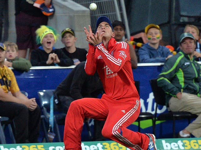 Alex Hales takes a catch during the first Twenty20 match against Australia, which England lost by 13 runs 