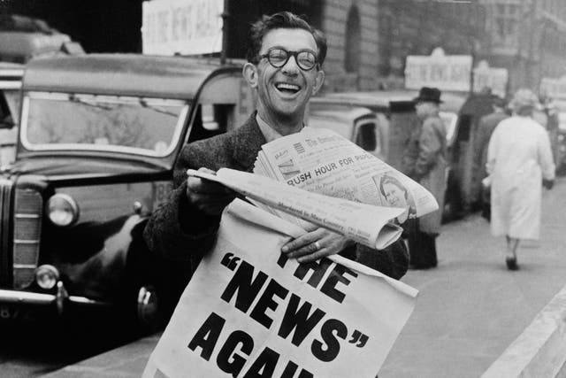 Hot off the press: A newspaper vendor in Fleet Street in 1955
