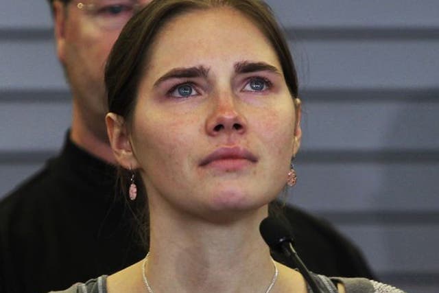 Amanda Knox giving a press conference after landing in the US following her acquittal in 2011