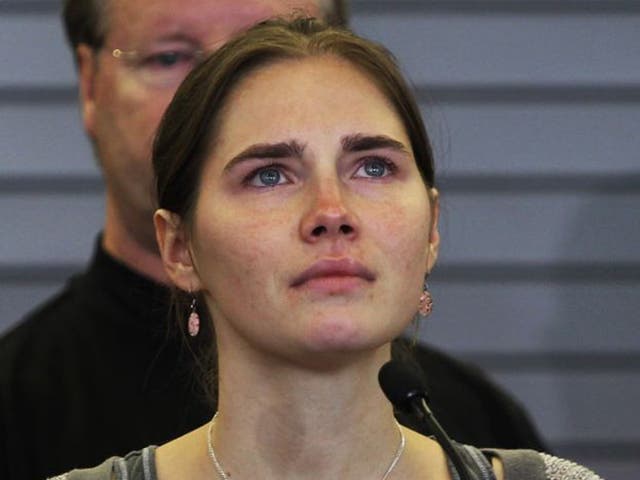 Amanda Knox giving a press conference after landing in the US following her acquittal in 2011