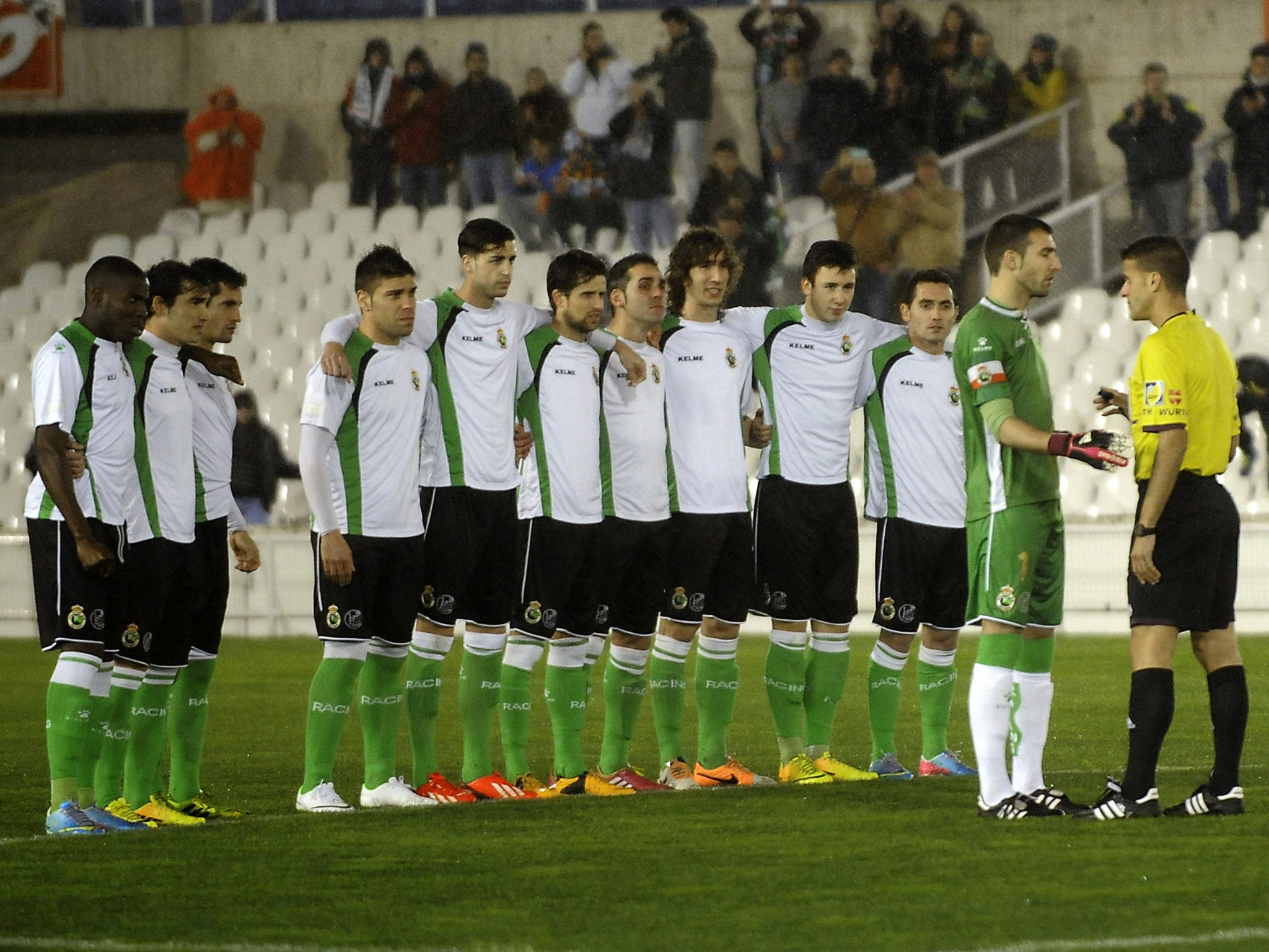 Racing Santander speak to the referee after refusing to contest their Copa del Rey quarter-final due to unpaid wages