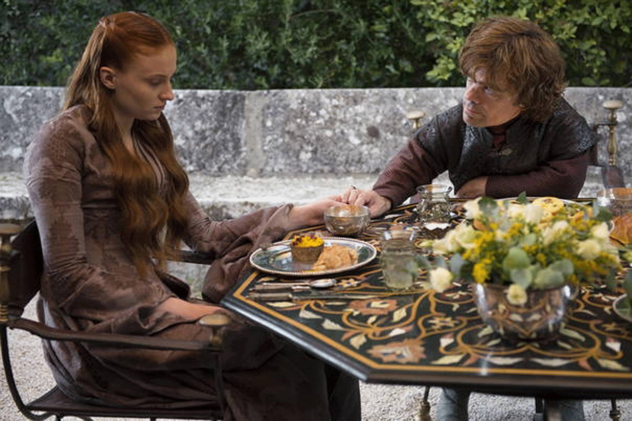 Sophie Turner and Peter Dinklage as Sansa and Tyrion