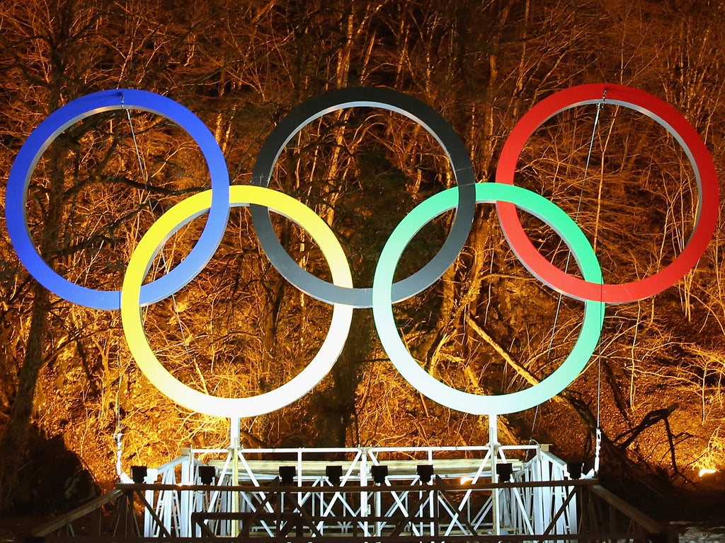 The Olympic Rings are illuminated in the Rosa Khutor Mountain Cluster village ahead of the Sochi 2014 Winter Olympics on January 31, 2014 in Rosa Khutor, Sochi, Russia.