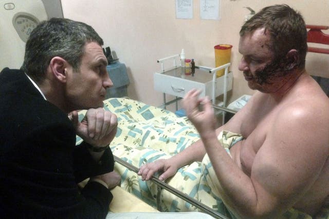 Opposition leader Vitali Klitschko visits Dmytro Bulatov, who claims he was tortured, in hospital, in Kiev