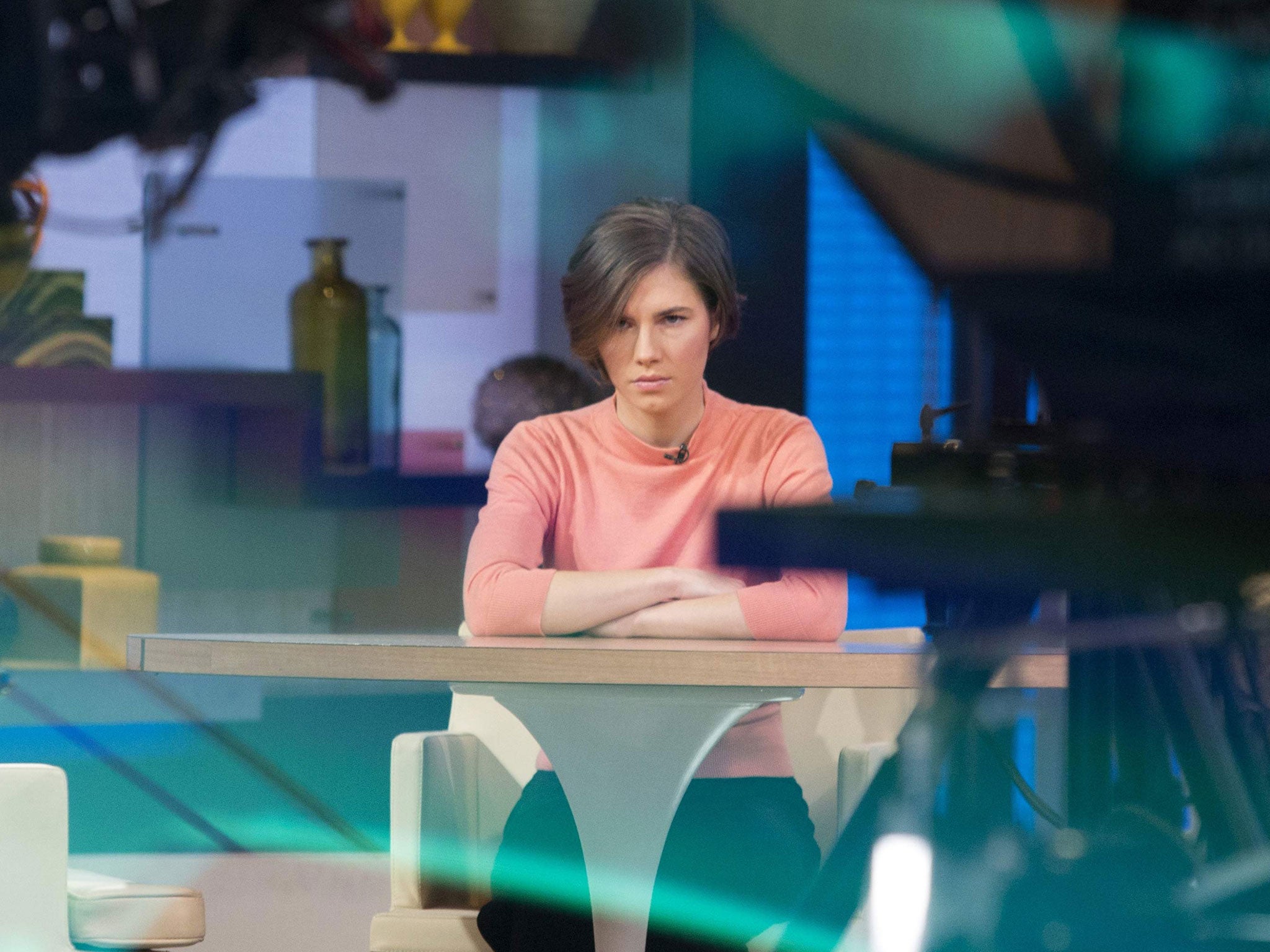 Amanda Knox sits alone before being interviewed on 'Good Morning America'
