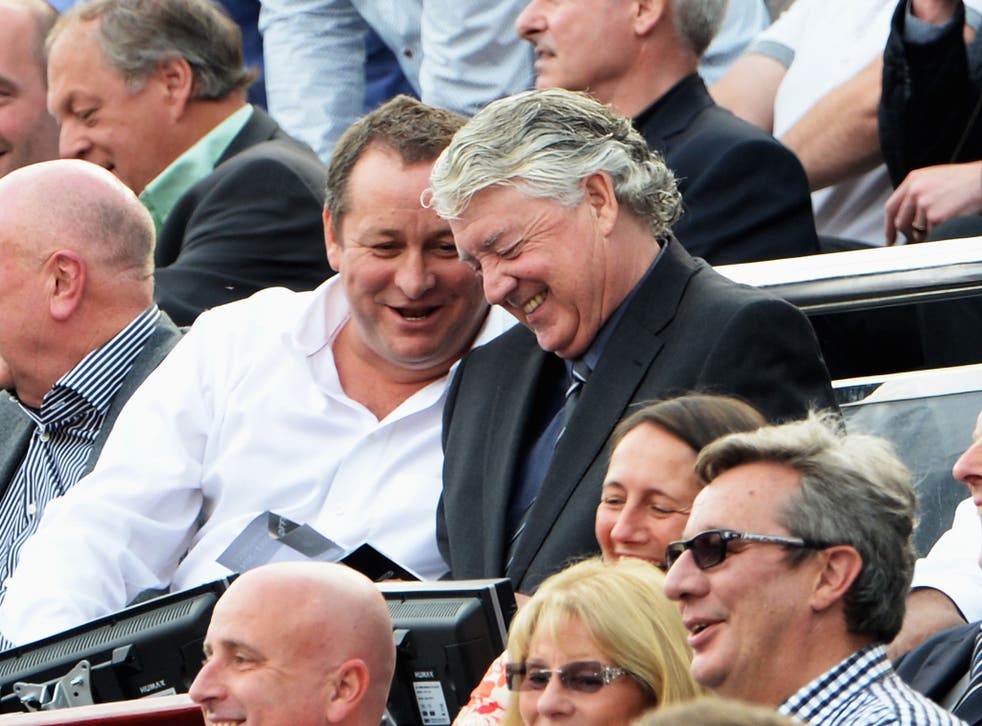 Mike Ashley and Joe Kinnear enjoy their seats at the heart of St James's Park 
