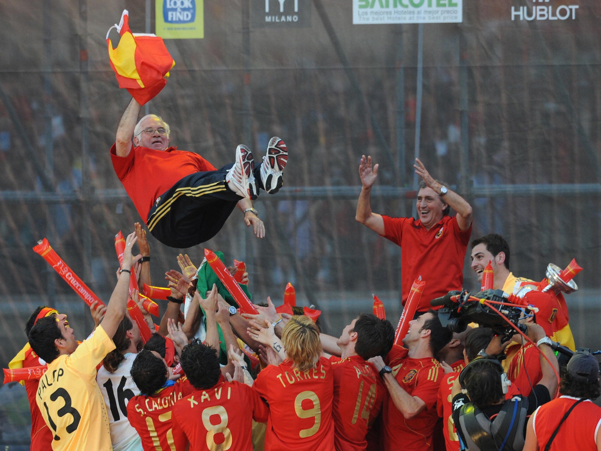 Aragones is given the 'bumps' by his players after the Euro 2008 success