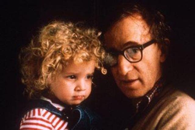 Dylan Farrow and Woody Allen, pictured in 1988