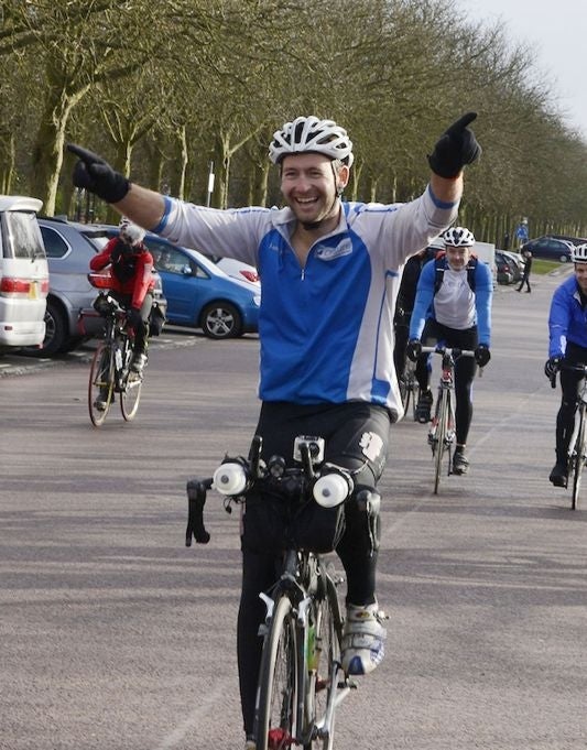 James Ketchell, the adventurer who was seriously hurt in a motorbike accident has thought to have cycled into the record books by becoming the first person to complete the trio of gruelling challenges, as he crosses the finish line for his challenge at Greenwich Park, London.