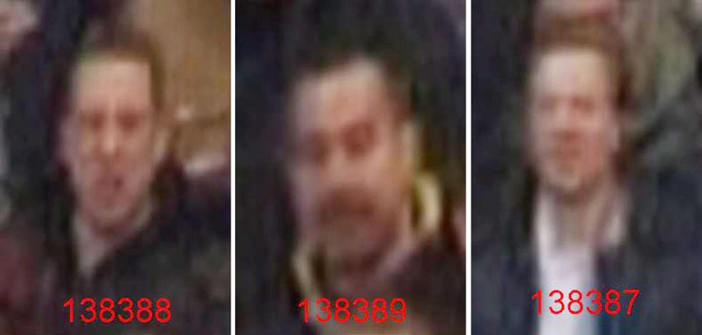 Grainy CCTV images issued by the Metropolitan Police of of the three men suspected of throwing coins at England winger Theo Walcott during an Arsenal-Spurs clash