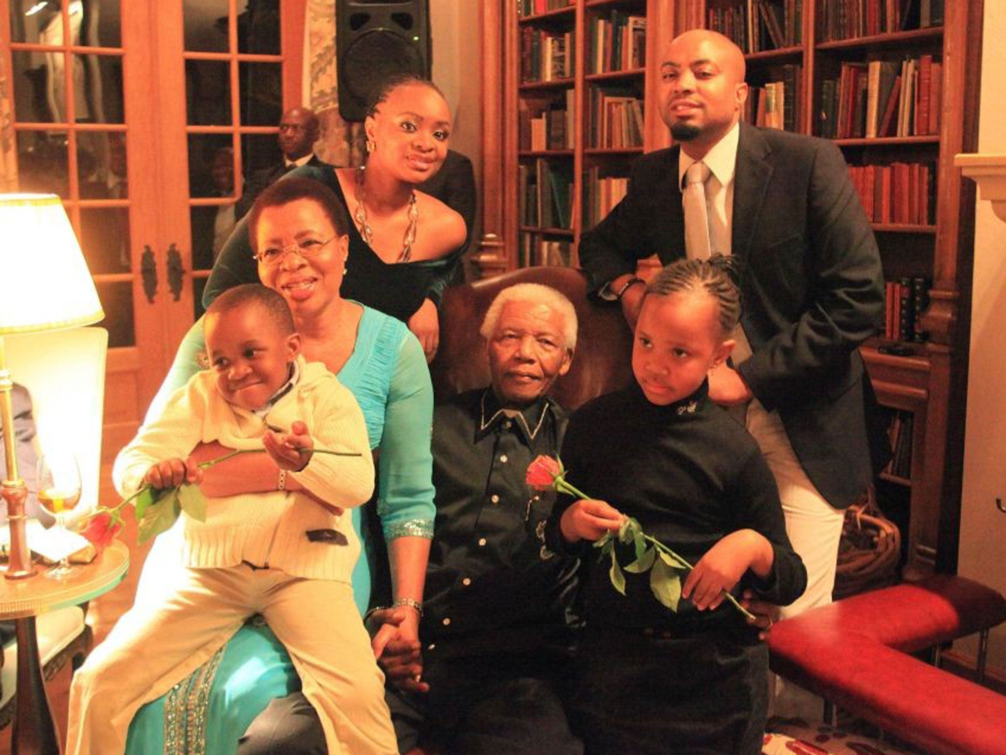 Nelson Mandela with his third wife, Graca Machel, her son Malengani and daughter Josina and their grandchildren Zizile Graca and Fanon Nzanji