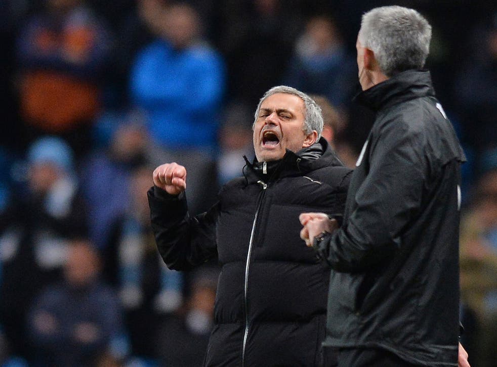 Jose Mourinho celebrates his Chelsea side's victory over Manchester City on Monday night
