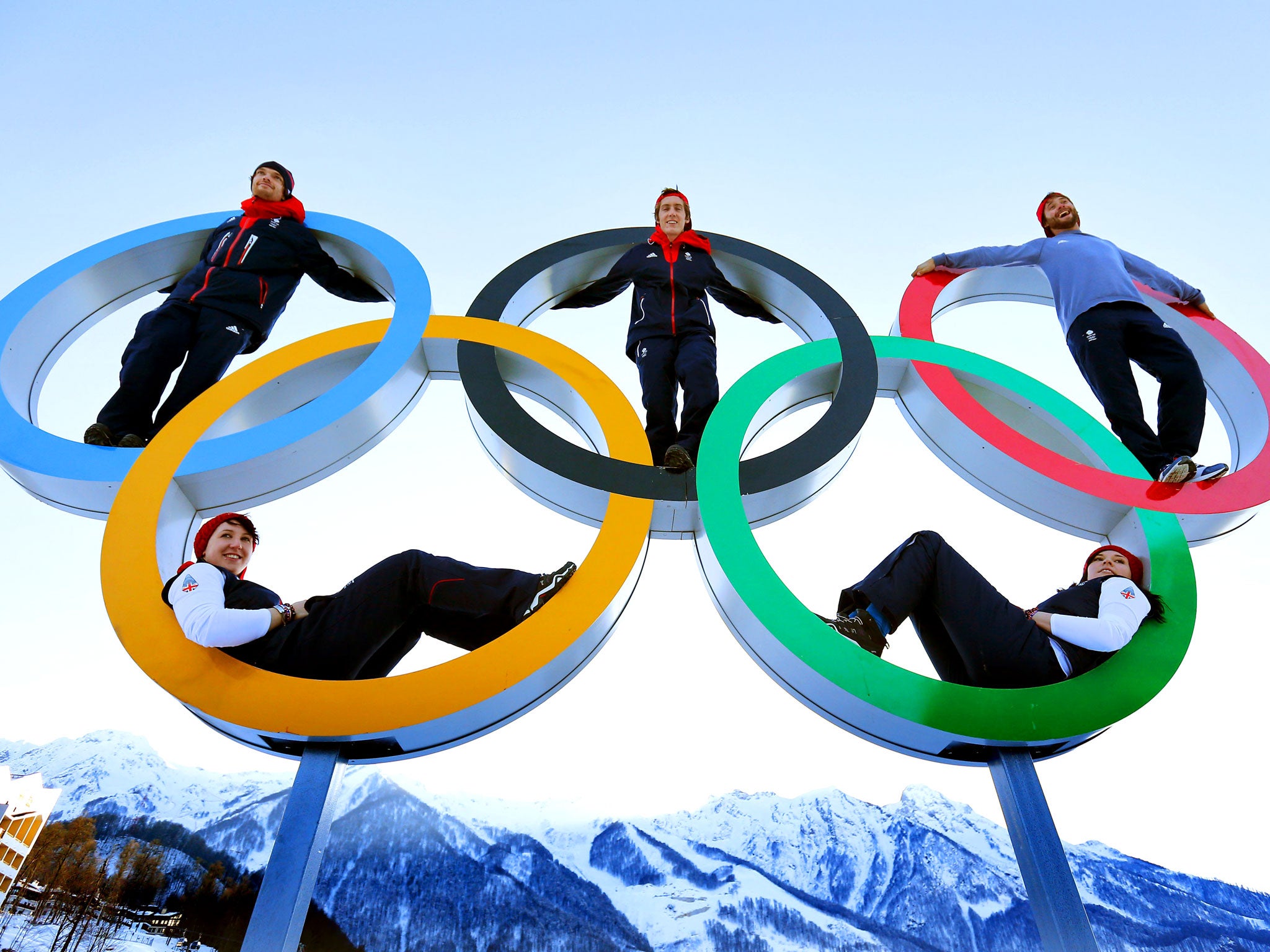 Great Britain Athletes, back row (L-R) Dom Harrington, Ben Kilner, Billy Morgan, back row (L-R) Rebekah Wilson and Paula Walker pose for a photograph in the Olympic Rings in the Athletes Village in Sochi