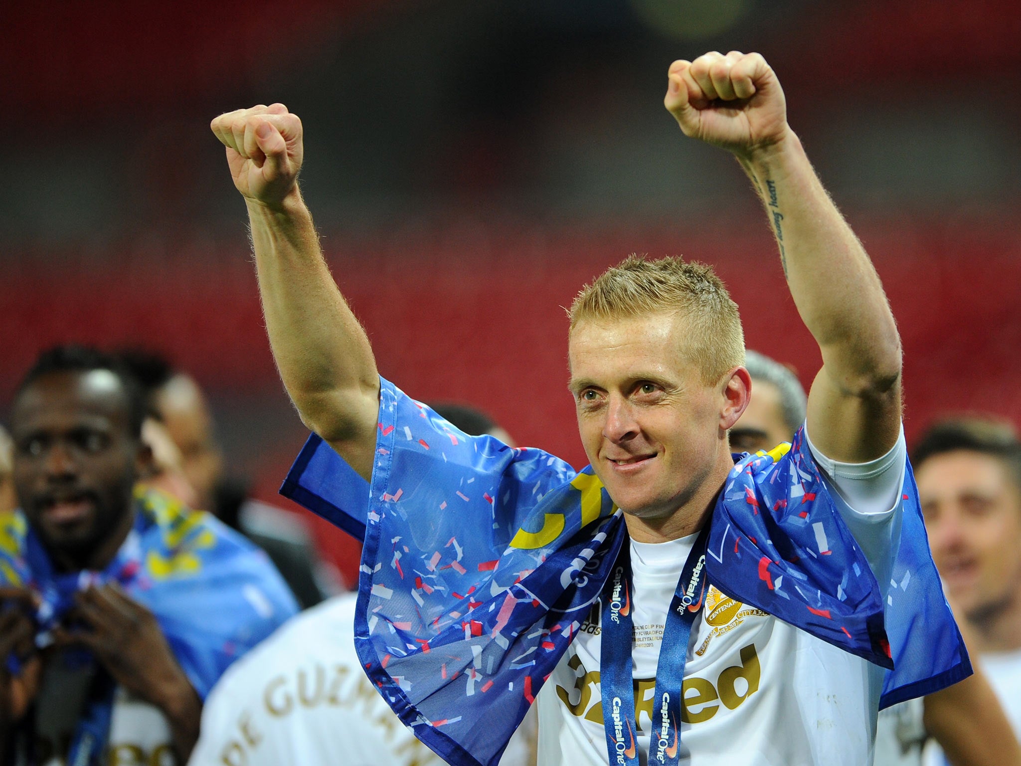 Garry Monk pictured celebrating after Swansea won the League Cup in 2013