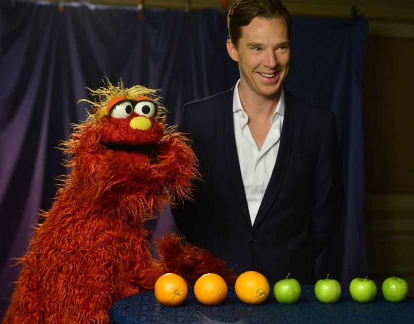 "Sesame Street" character Murray Monster, left, and actor Benedict Cumberbatch during the taping of a video posted Tuesday on PBS' YouTube channel.