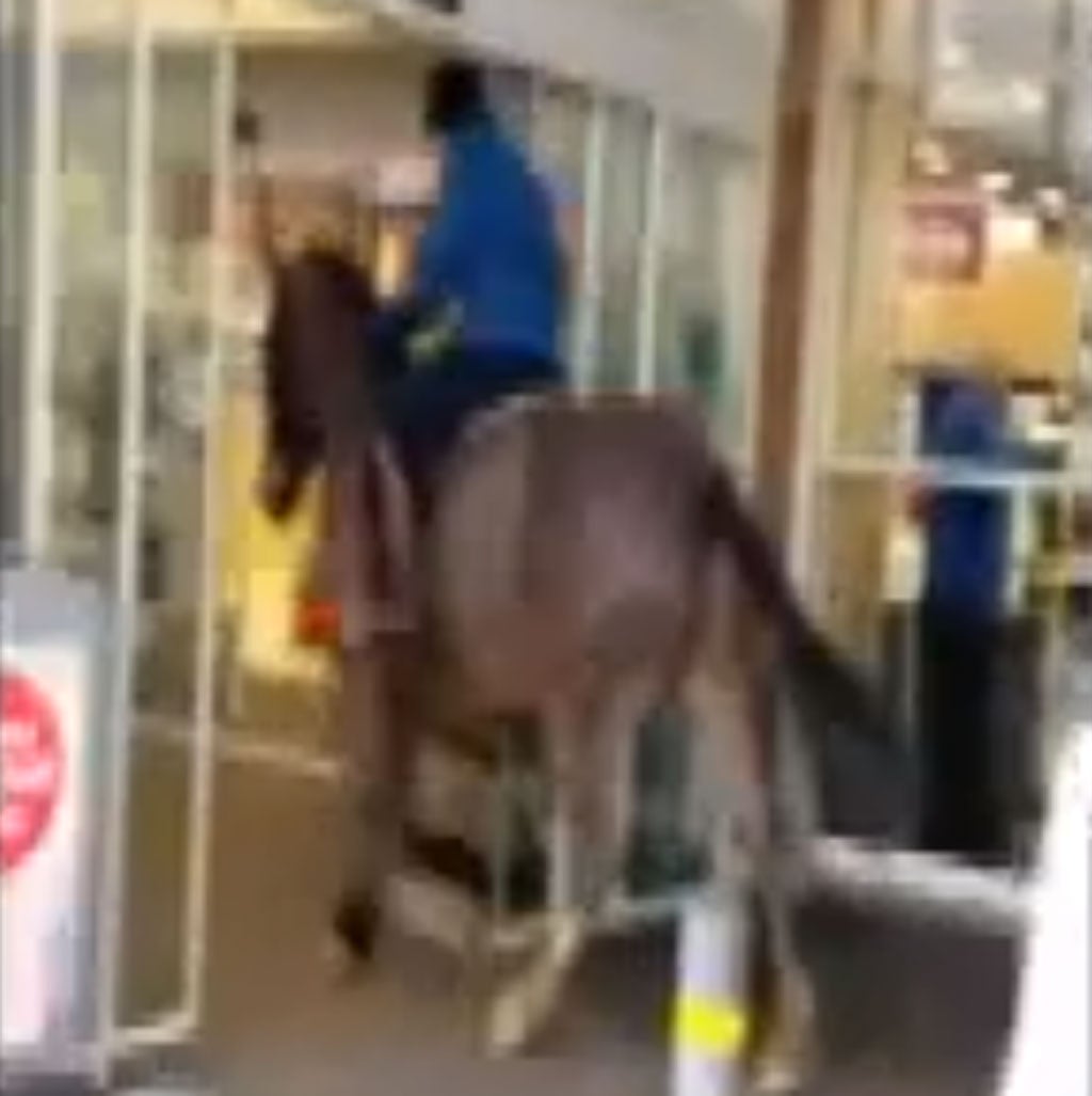 Police said they were investigating after a woman rode a horse into a Tesco store in Durham