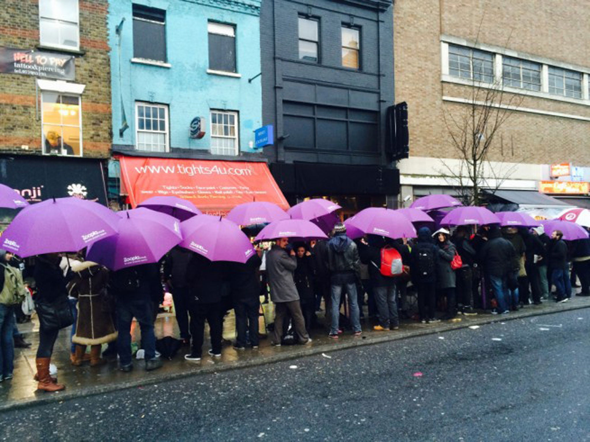 Purple rain: hundreds of Prince fans queued in the rain to see the musician play a secret show in Camden, North London