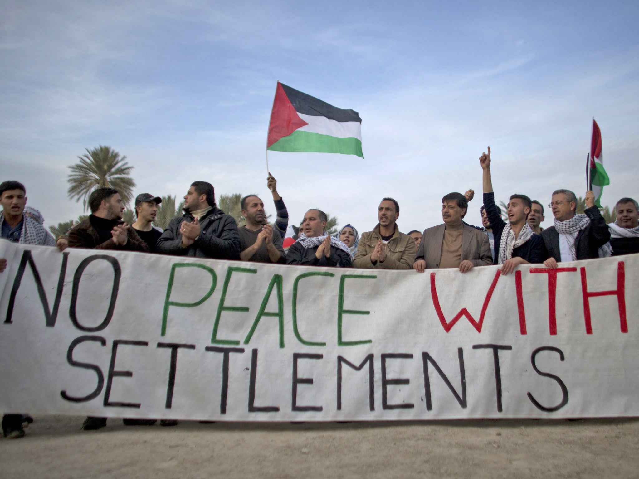 Palestinians activists protest against Jewish settlements last month