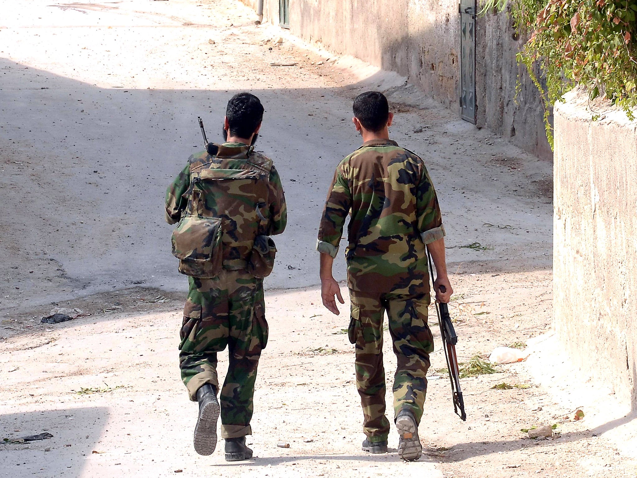 Syrian soldiers in Aleppo, where Muhammed fled from