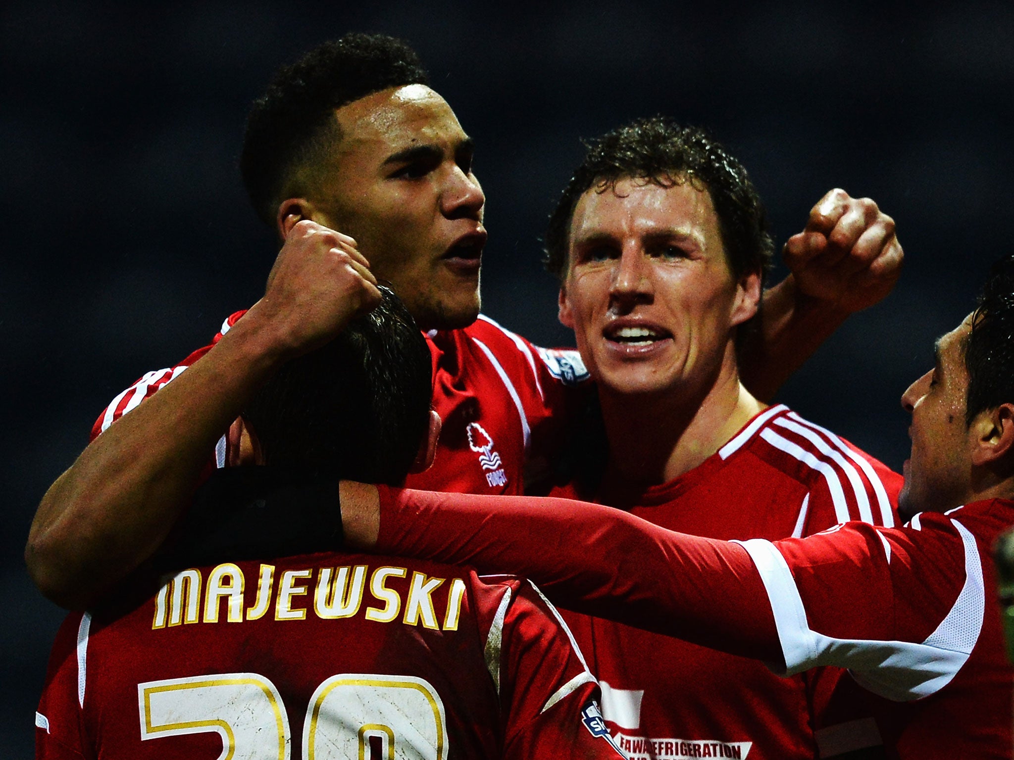 Nottingham Forest celebrate their second goal of the night, scored by Darius Henderson (centre)