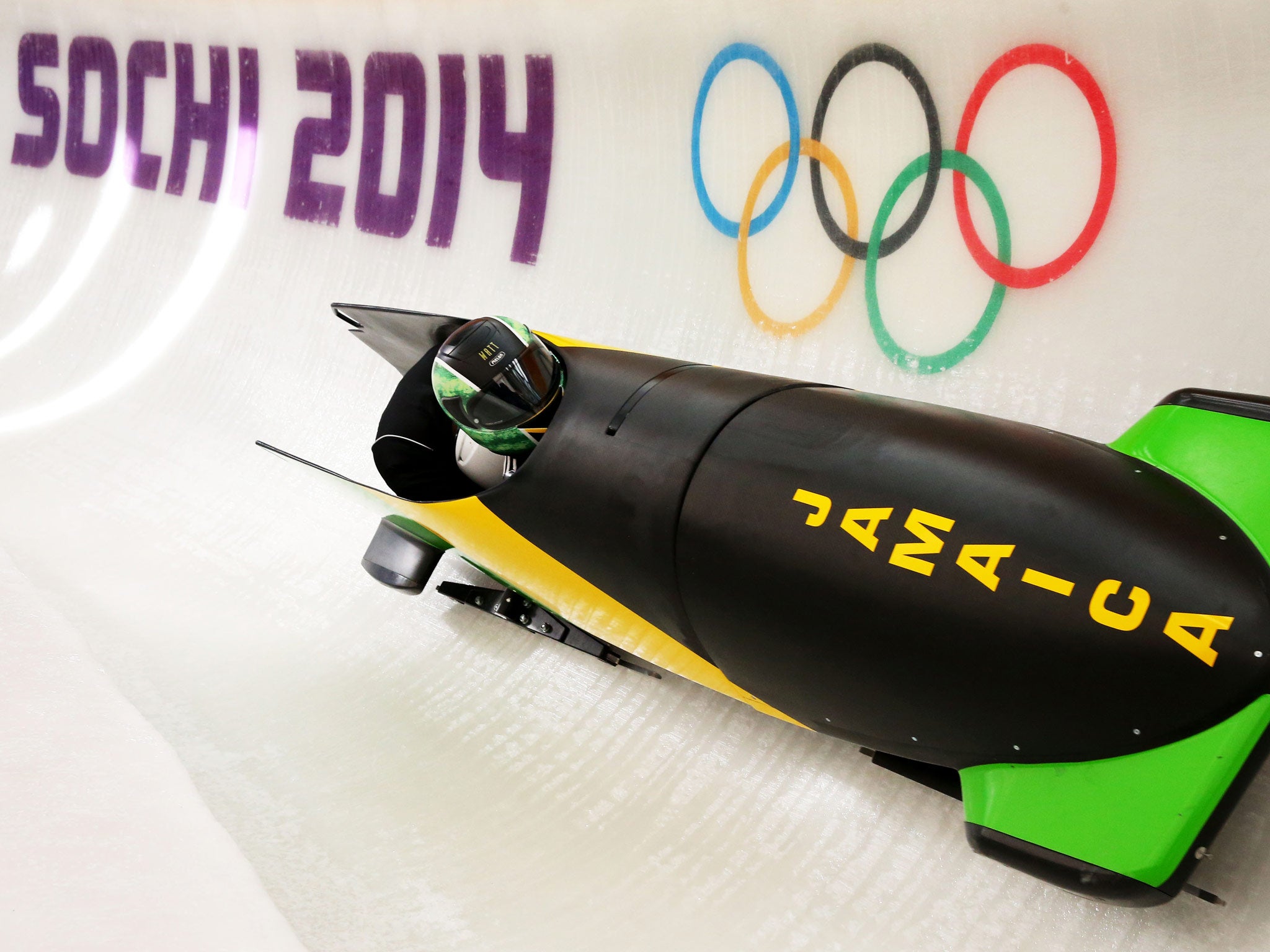 Winston Watts of Jamaica pilots a bobsleigh practice run ahead of the Sochi 2014 Winter Olympics