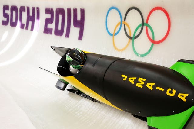 Winston Watts of Jamaica pilots a bobsleigh practice run ahead of the Sochi 2014 Winter Olympics 