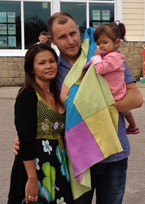 Yupa and Nick Pugh with their three-year old daughter, Tia