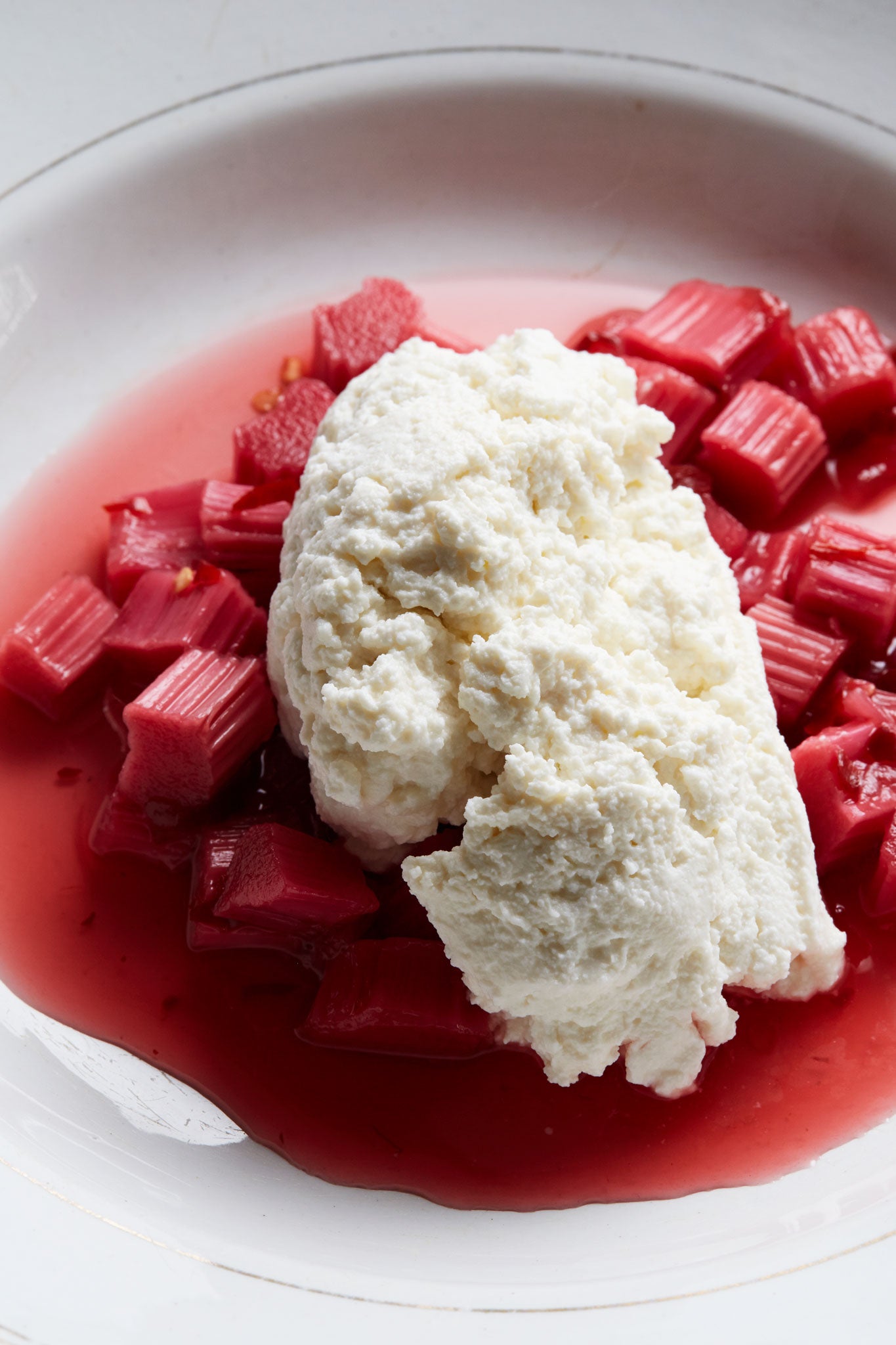 Ricotta with spiced rhubarb is a simple dessert to execute for a dinner party