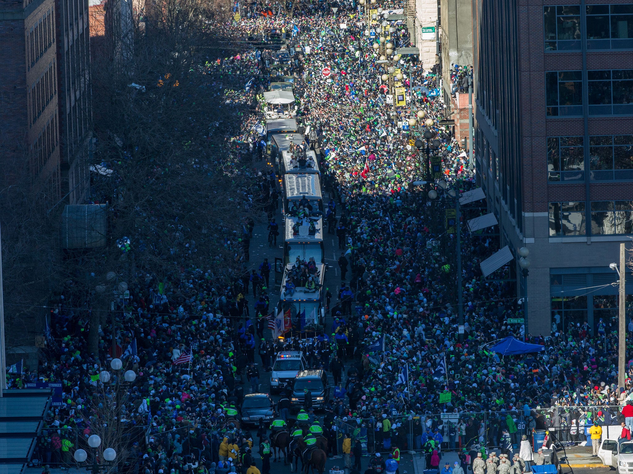 Seattle fans line the streets to celebrate with the victorious Super Bowl champions the Seattle Seahawks