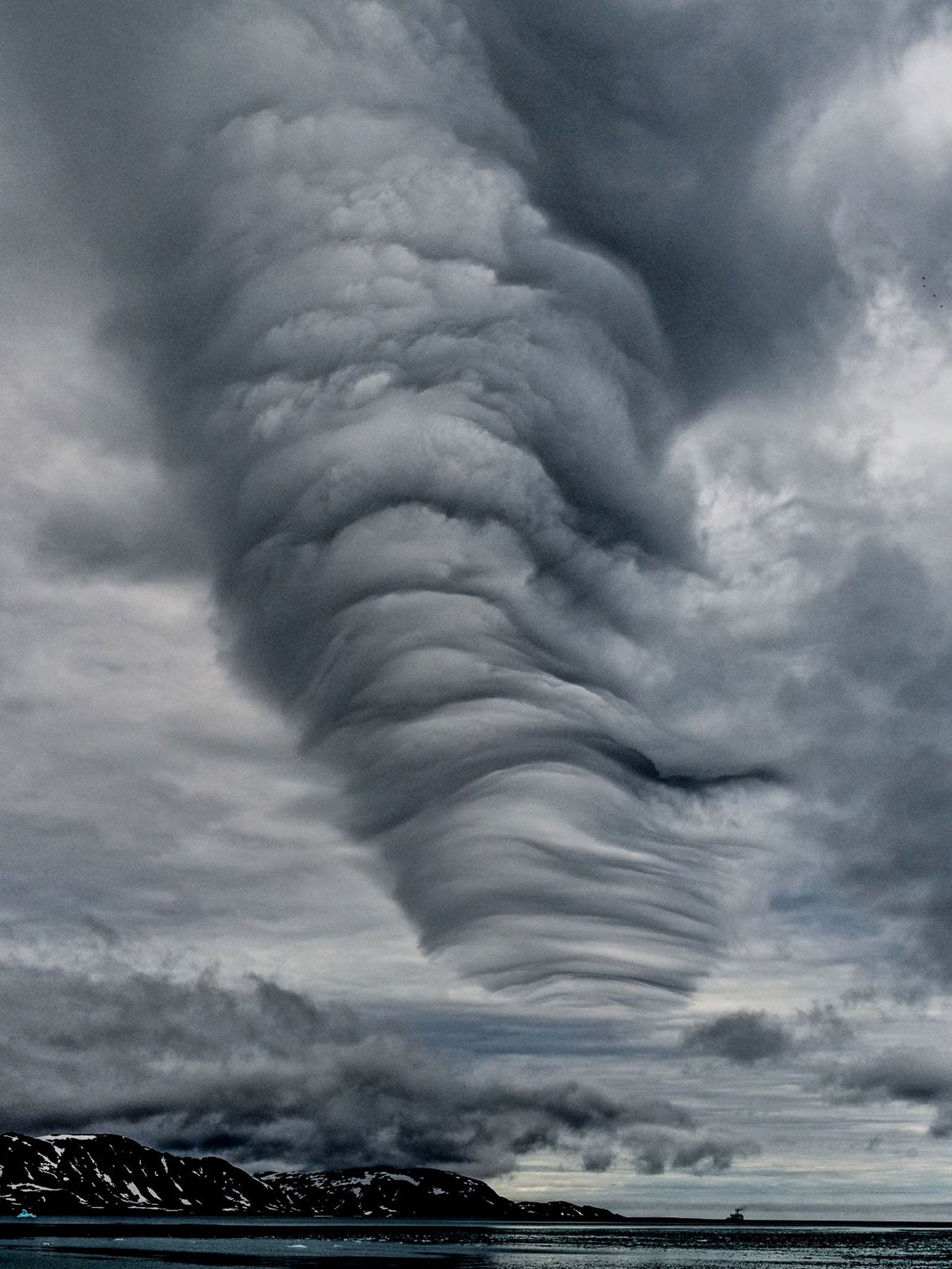 4. Winner: Landscape category. Tornado cloud (Svalbard, Norway) by Andy Barnes