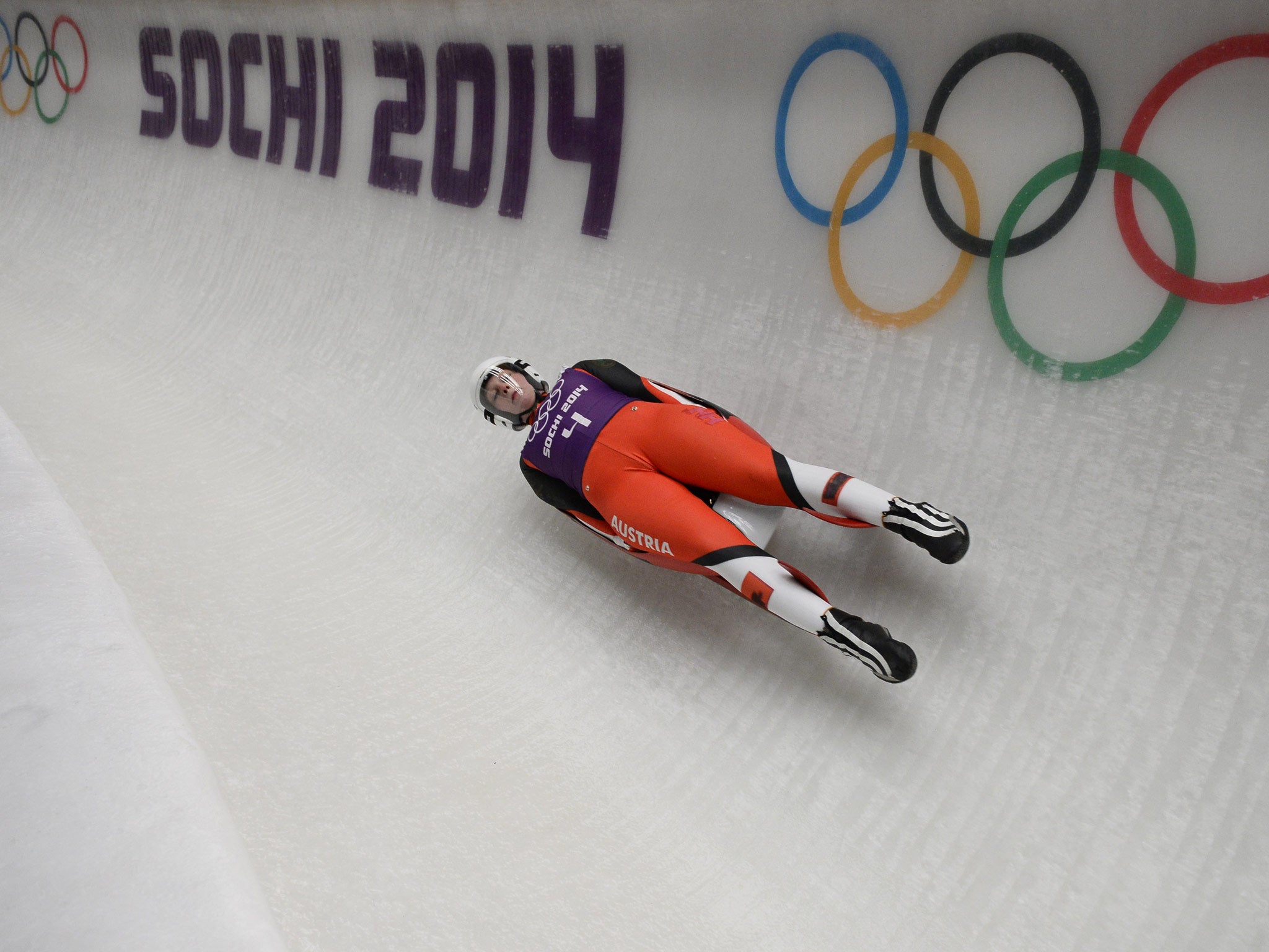 Austria's Miriam Kastlunger races during a women's Luge training session at the Sanki Sliding Centre in Rosa Khutor