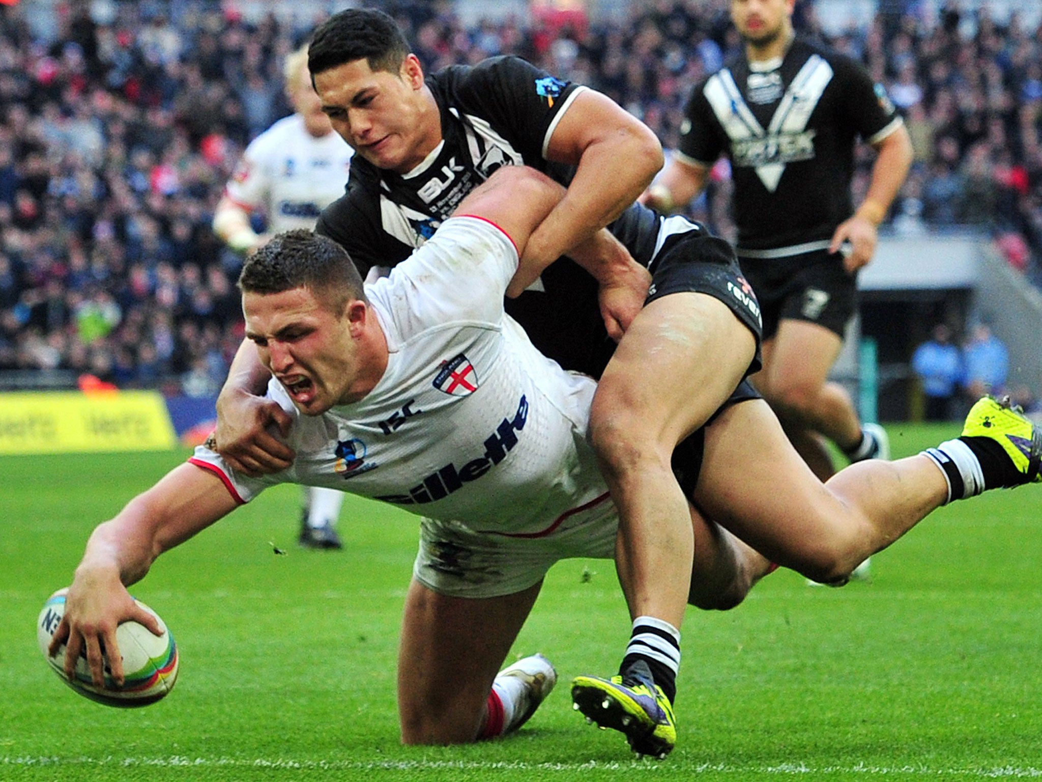 Sam Burgess scores a try for England during last year’s Rugby League World Cup
