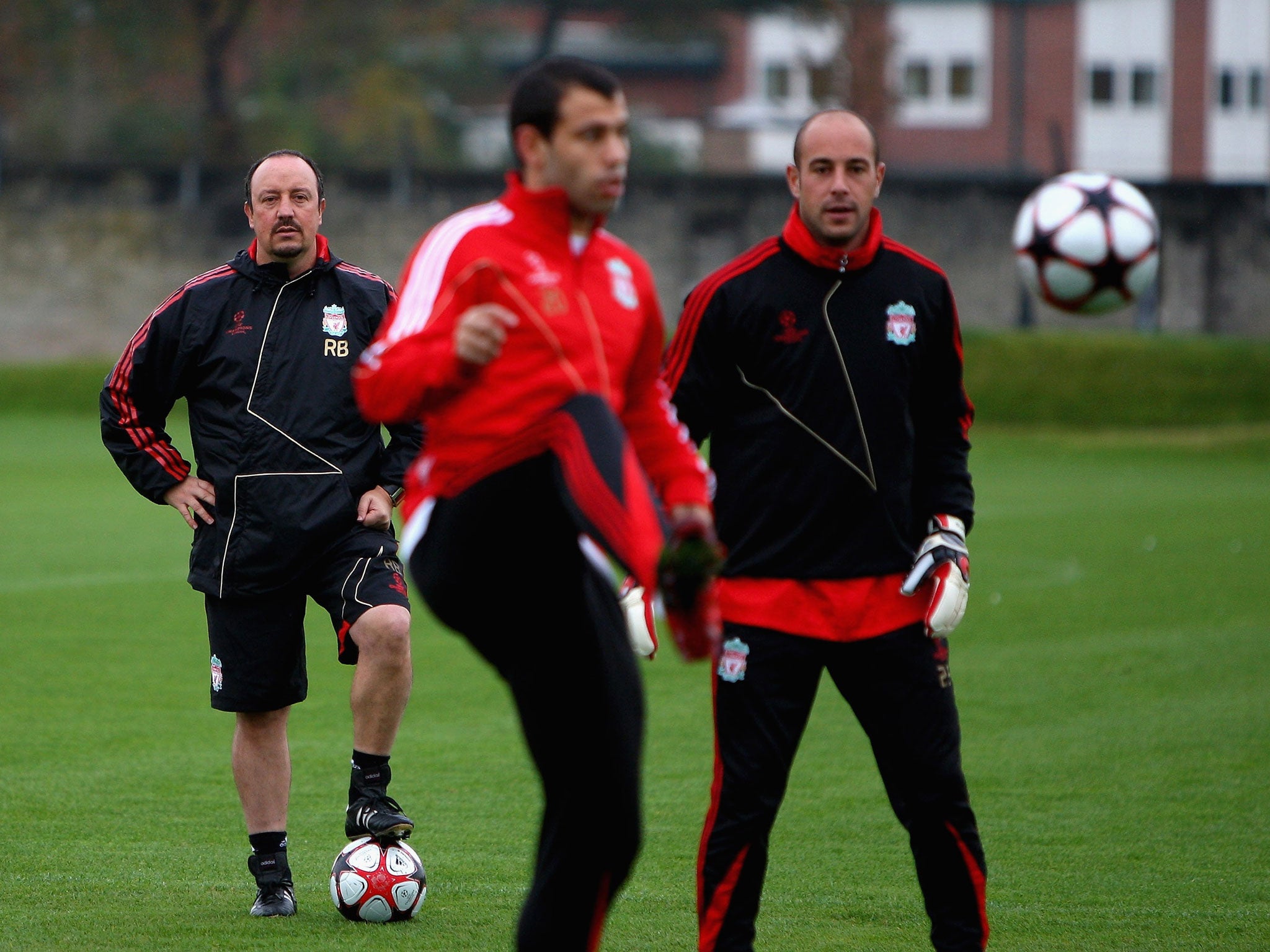 Watching Javier Mascherano and Pepe Reina during Liverpool training in 2009. A conversation with Mascherano persuaded him to join Liverpool from West Ham during the January transfer window, while Reina is now enjoying a new lease of life on loan at Napoli