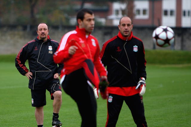 Watching Javier Mascherano and Pepe Reina during Liverpool training in 2009. A conversation with Mascherano persuaded him to join Liverpool from West Ham during the January transfer window, while Reina is now enjoying a new lease of life on loan at Napoli