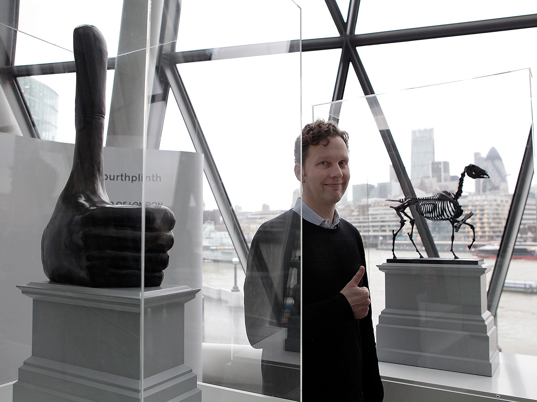 David Shrigley with a maquette of his sculpture 'Really Good' which has been chosen to stand on Trafalgar Square's Fourth Plinth in 2016