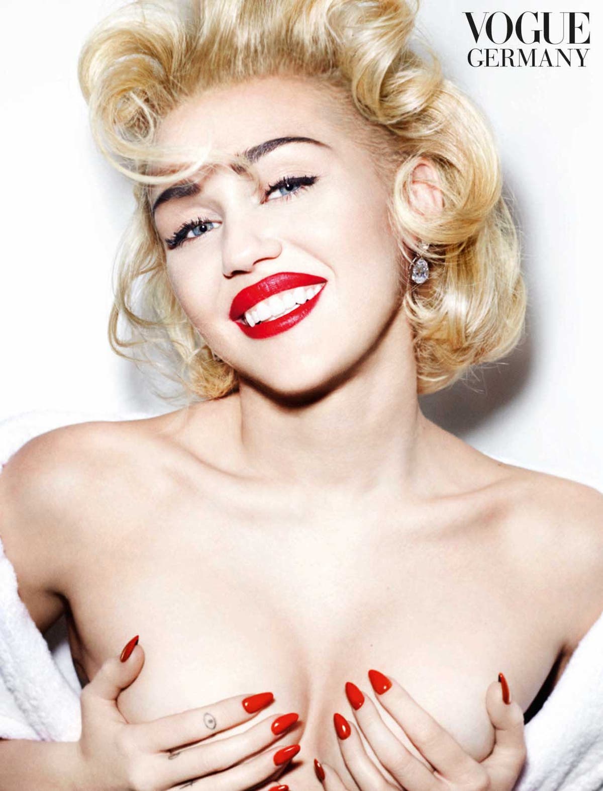 1200px x 1573px - Miley Cyrus morphs into Madonna for topless German Vogue pose | The  Independent | The Independent