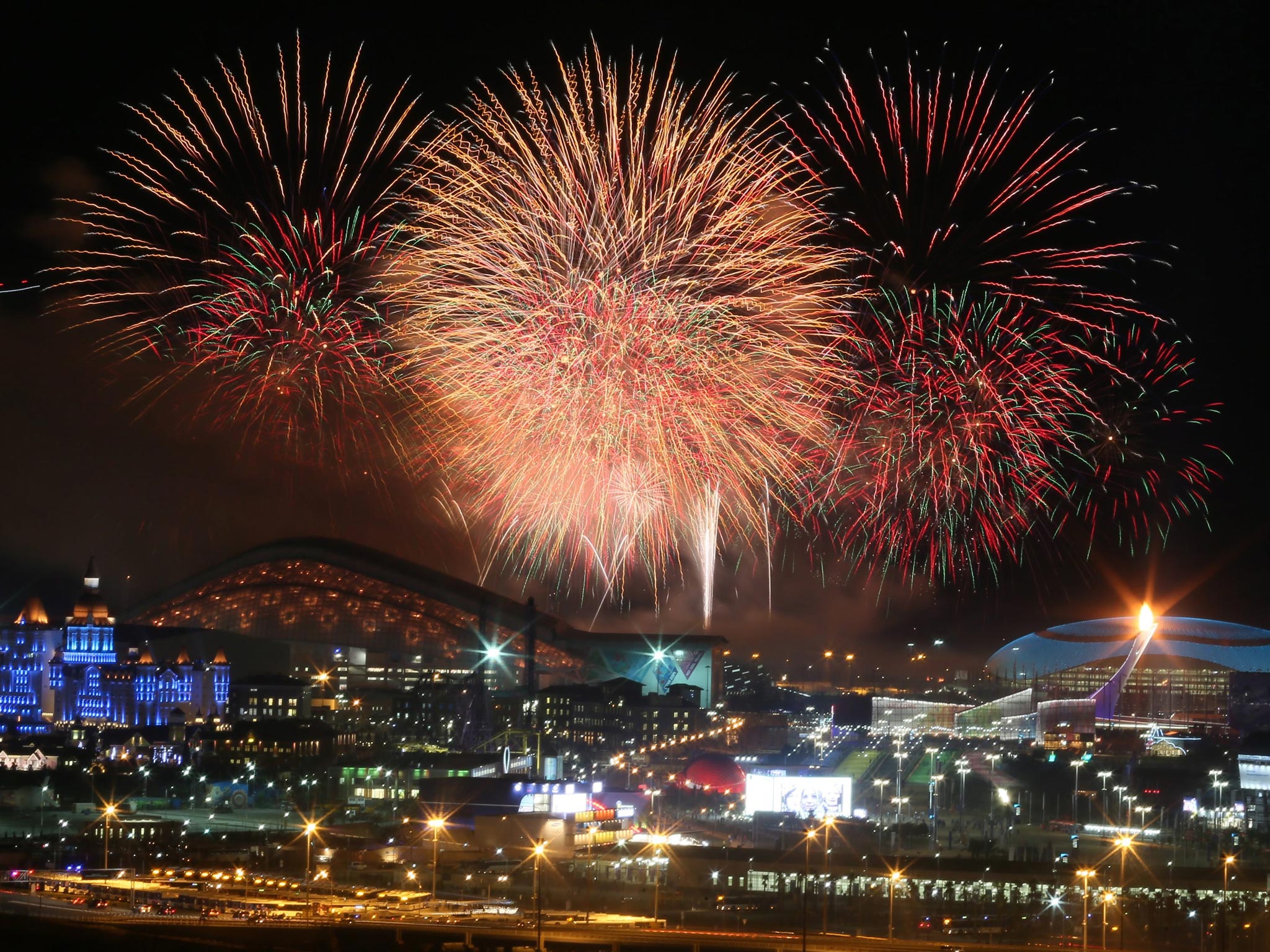 Fireworks go off over the Olympic Park at the end of the Opening Ceremony of the Sochi 2014 Olympic Games at the Fisht Olympic Stadium