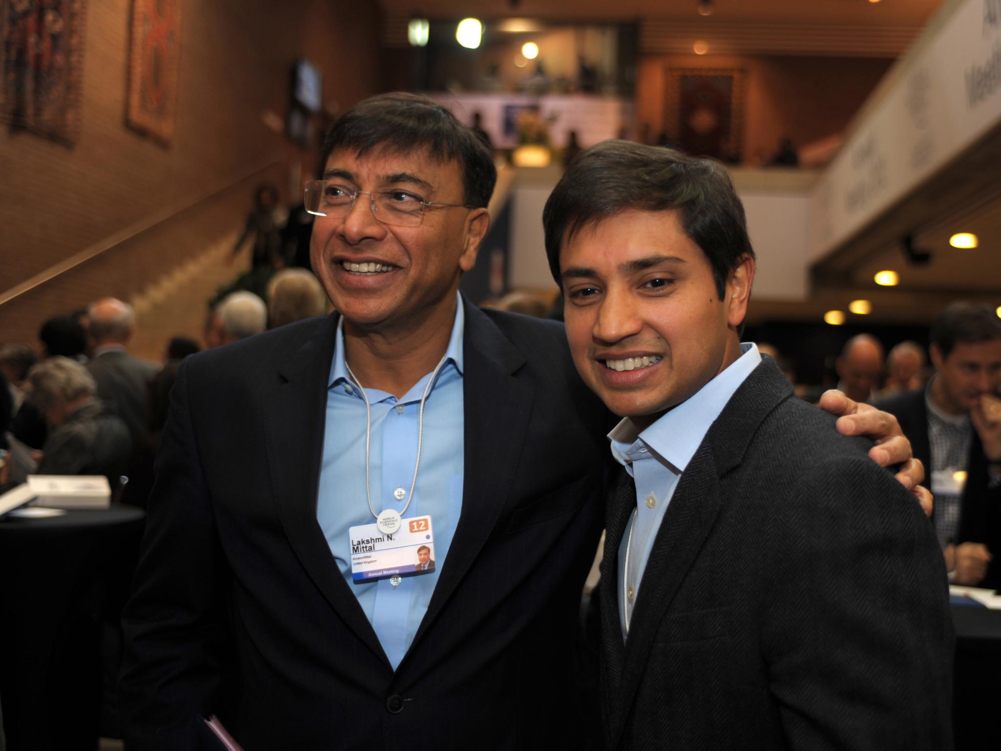 Lakshmi Mittal with his son Aditya Mittal, who is the chief financial officer of ArcelorMittal, during a Davos meeting