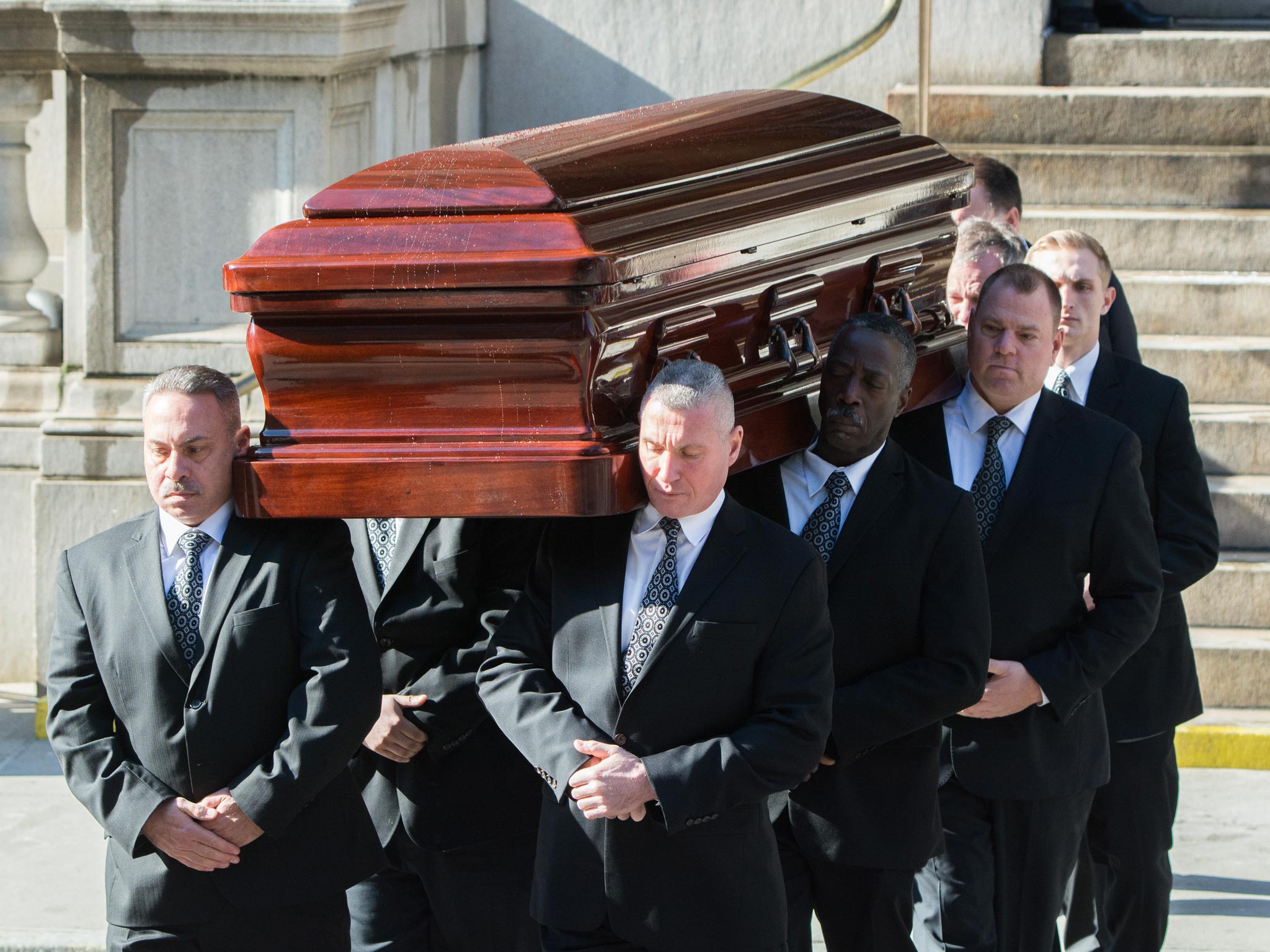 The casket carrying actor Philip Seymour Hoffman leaves the funeral service