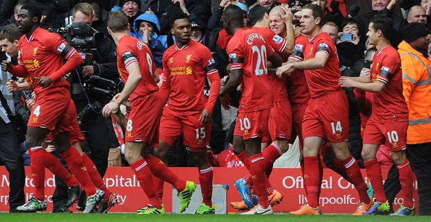 Liverpool players celebrate the 5-1 victory over Arsenal at Anfield